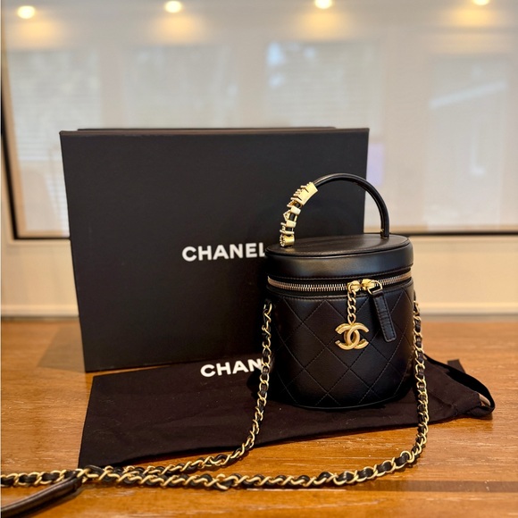 CHANEL Handbags - Chanel Black and Gold Mini Quilted Bag